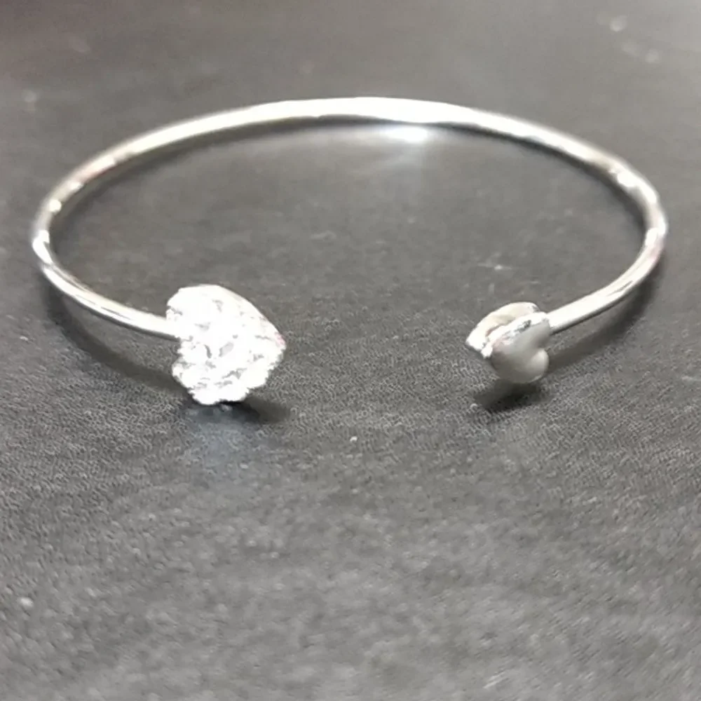 Child's silver tone heart bangle bracelet 7